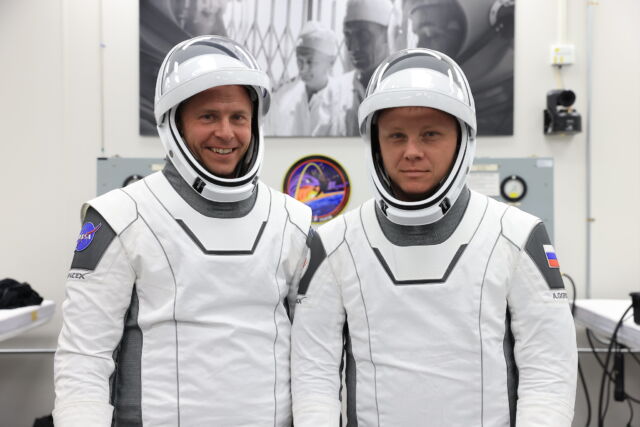 NASA astronaut Nick Hague and Russian cosmonaut Aleksandr Gorbunov in their SpaceX pressure suits.