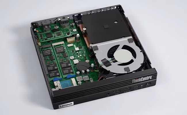 an internal image of a thinkpad mini pc which shows a tiny fan along with the motherboard