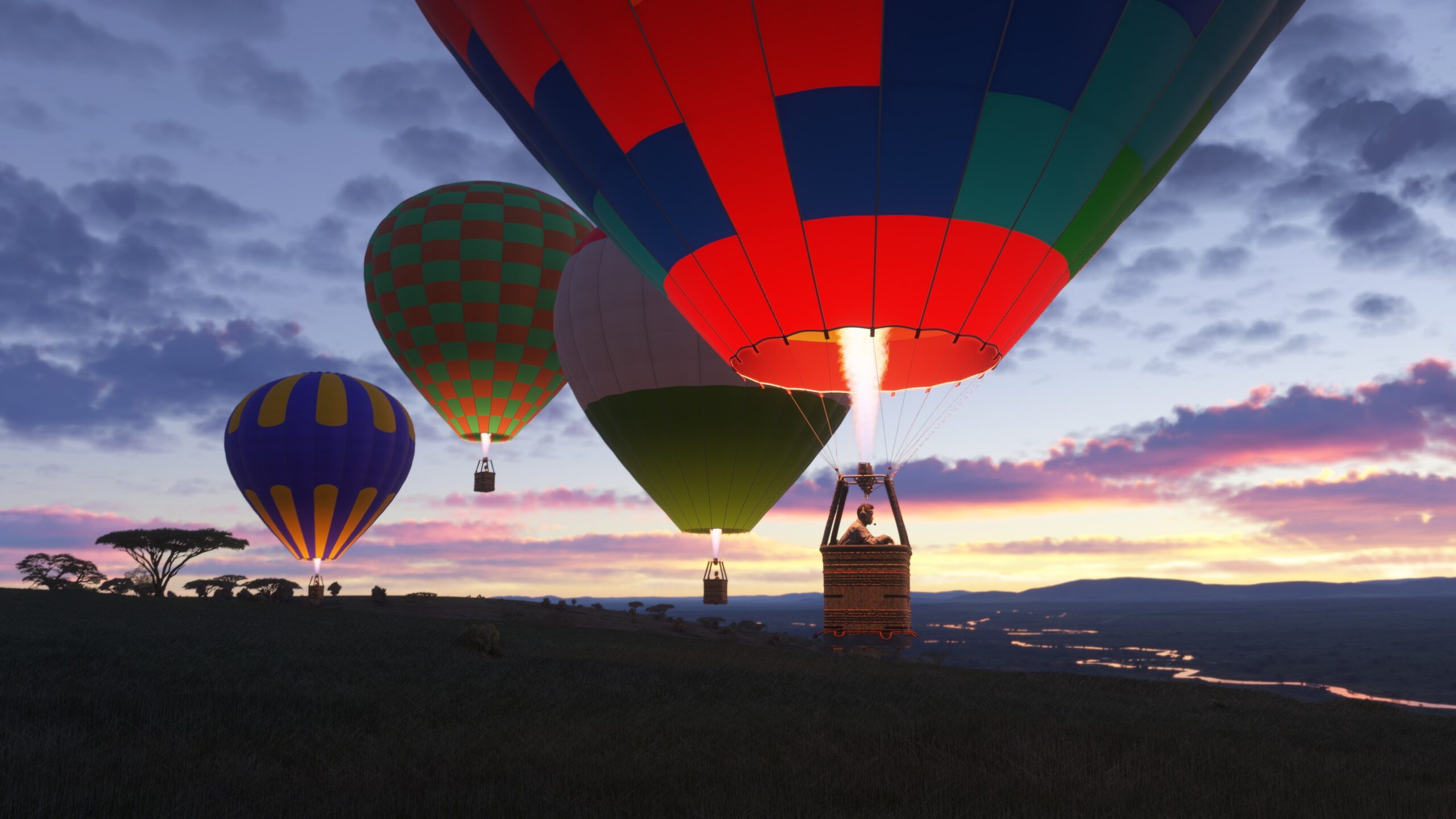 Hot air balloons across a night sky.