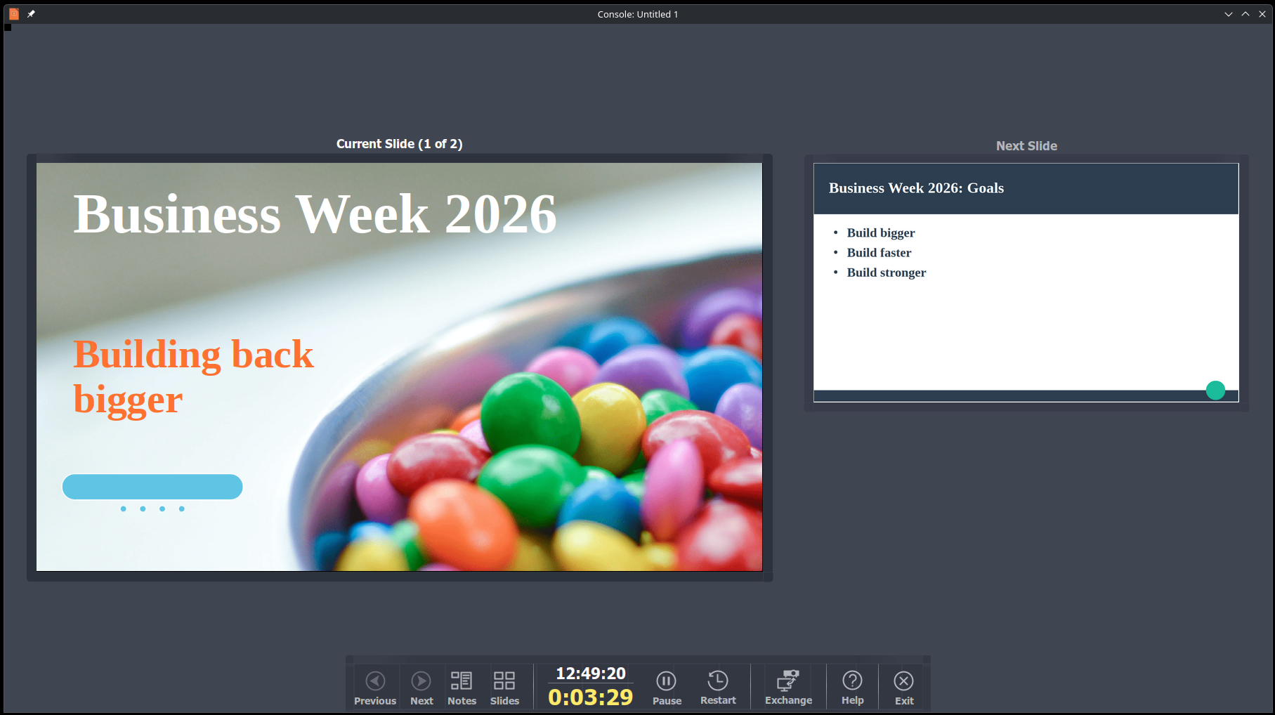 The presenter console in LibreOffice Impress, showing a presentation called "Business Week 2026: Building back bigger". The background is a closeup shot of candy in various colours.